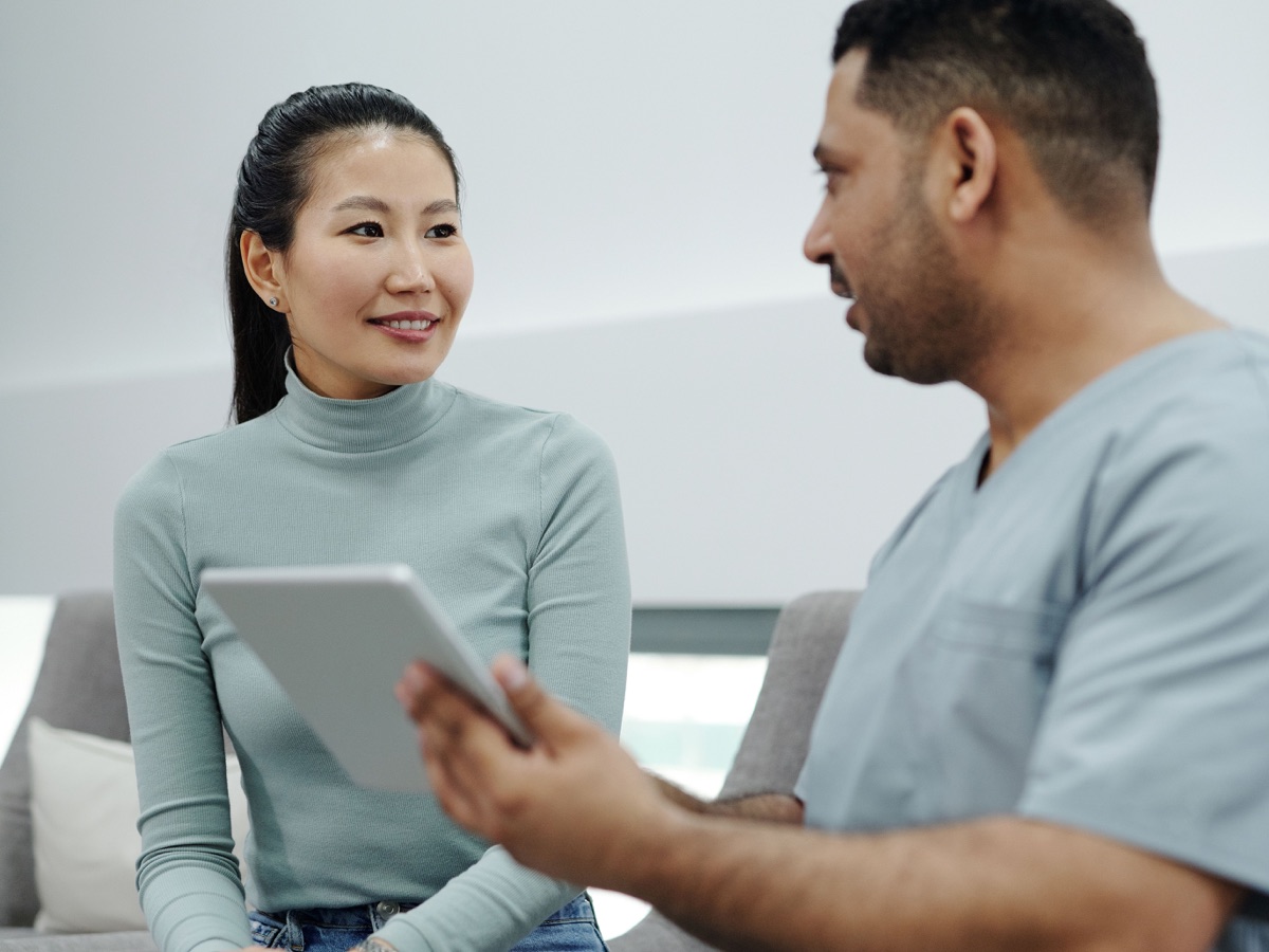 Healthcare professional discussing coverage with a patient